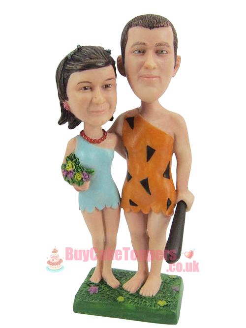 caveman couple wedding topper 