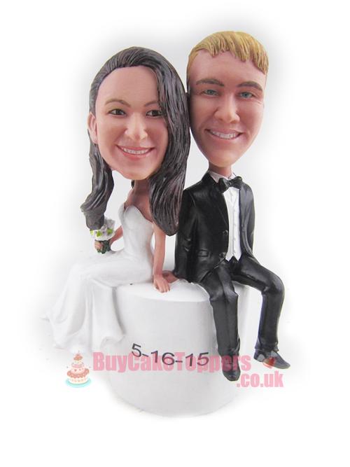 couple sit on cake topper couple sit on cake topper