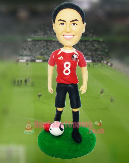 female footballer figurine 