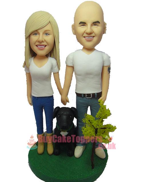 couple with doggy figurine couple with doggy figurine
