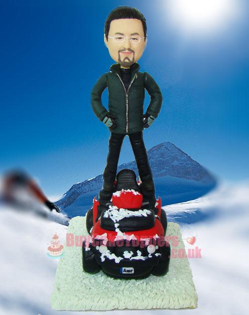 Snowmobile driver figurine 