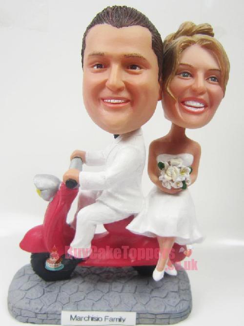 wedding cake topper couple ride scooter 